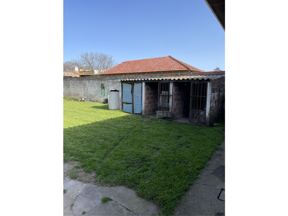 casa dos dormitorios y quincho sobre terreno de 400m2 - 4
