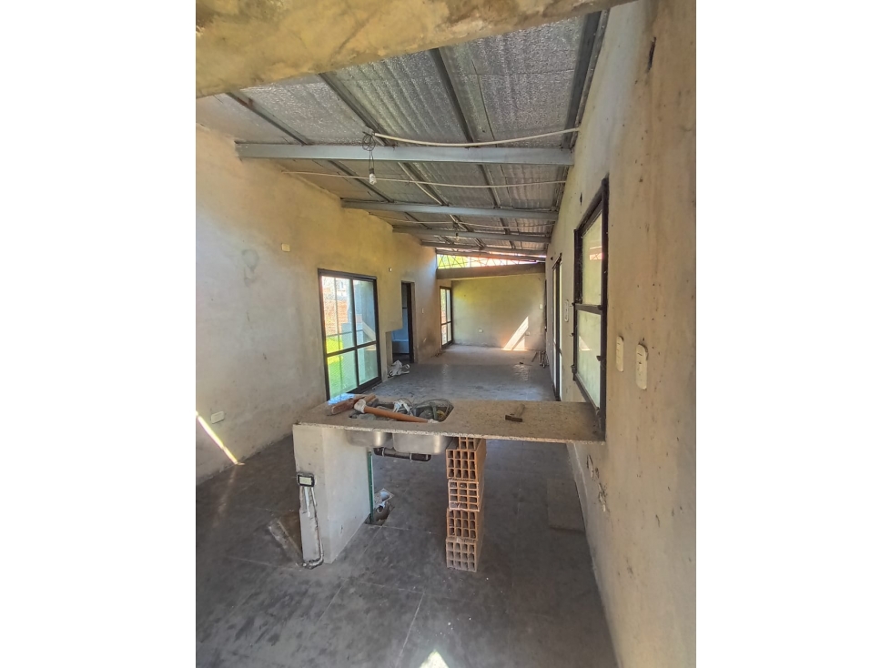 Casa a estrenar 1 ambiente divisible con parque y galería en Olmos — foto 6