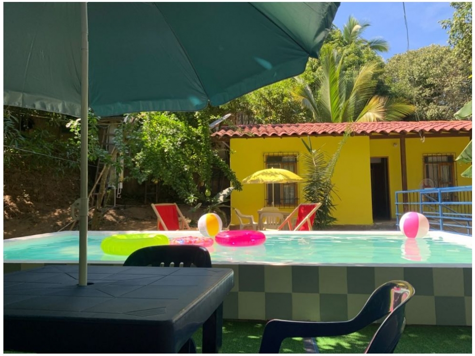 DOS CABAÑAS, UNA PISCINA Y UN MUNDO HERMOSO TIGRERA VÍA A MINCA