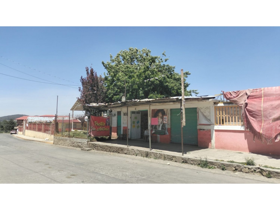 Propiedad con dos locales y una cisterna de 10 mil lts. sobre avenida - 1