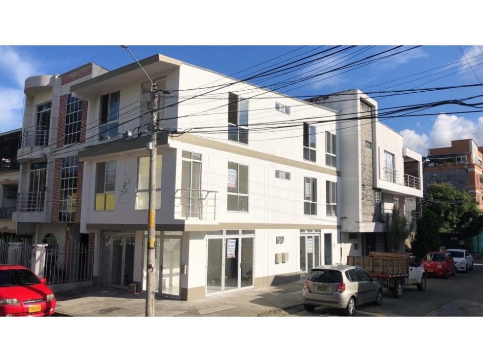 Edificio con 3 Locales y 2 Apartamentos Ingreso Mensual - 1