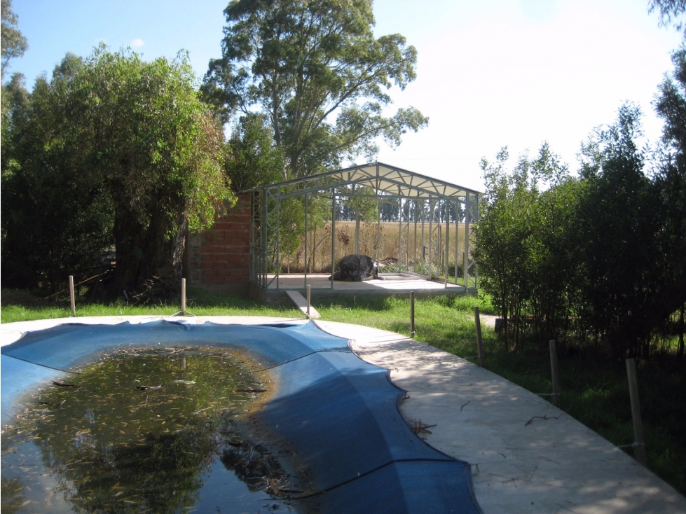LOTE CON MEJORAS EN BARRIO " LA ARMONÍA" PILETA Y QUINCHO / FINANCIA