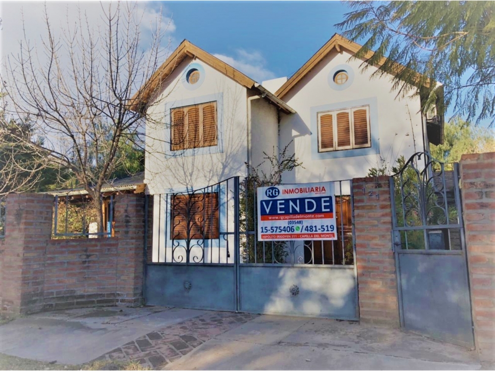 VENTA DE HERMOSA CASA CON DPTO EN DOS LOTES -CAPILLA DEL MONTE -CBA - 1