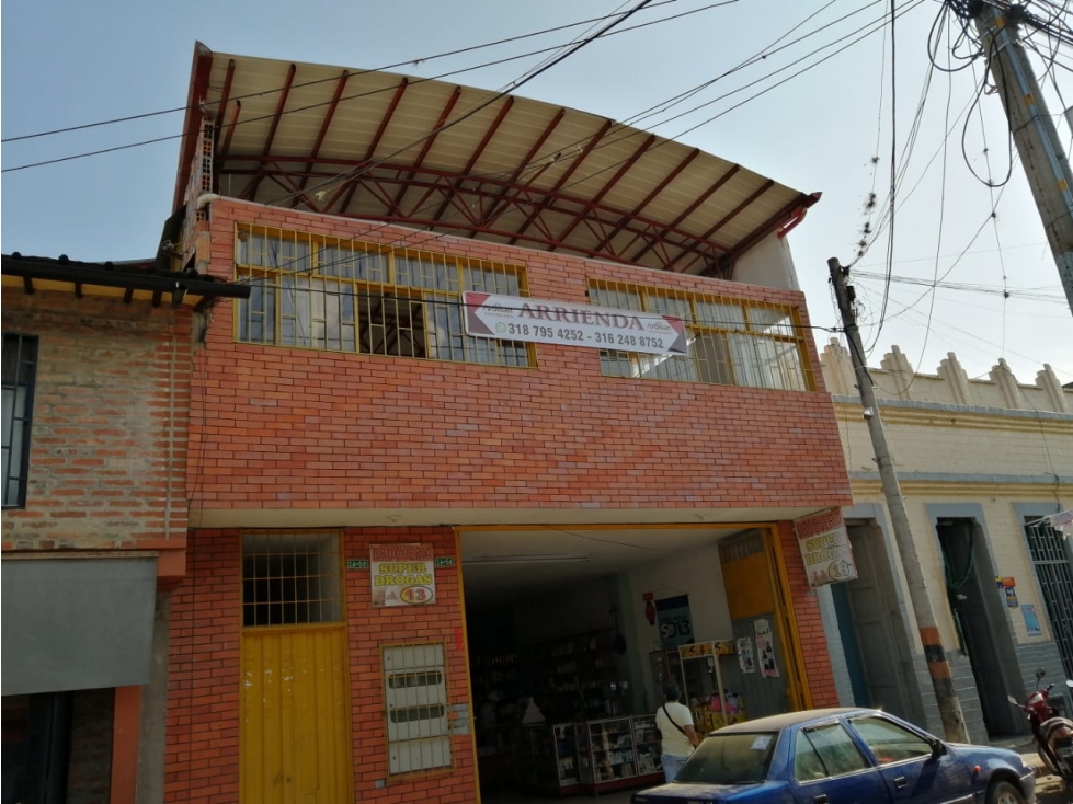 CASA COMPRENDIDA POR DOS LOCALES COMERCIALES - 6
