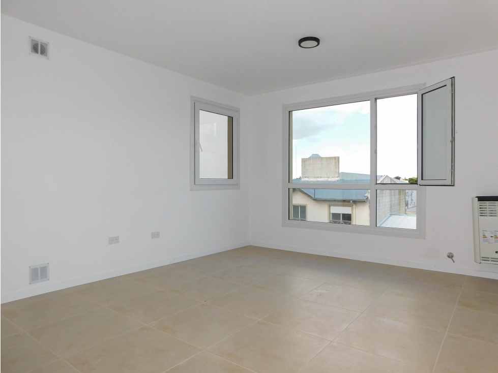 TANDIL Venta Departamento a Estrenar, 1 dorm. y cochera en semi-centro - 1