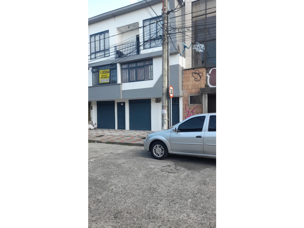 EDIFICIO DE HABITACIONES -LOCALES AL OCCIDENTE - 1