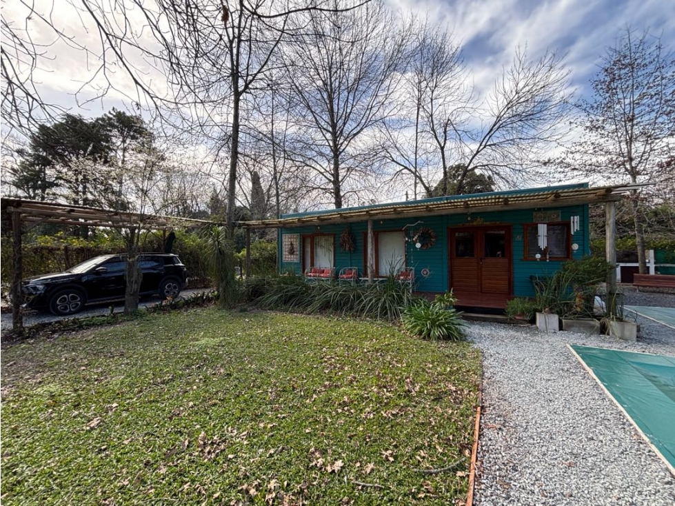 Casa en venta con dos dormitorios, parque, piscina y quincho - 5