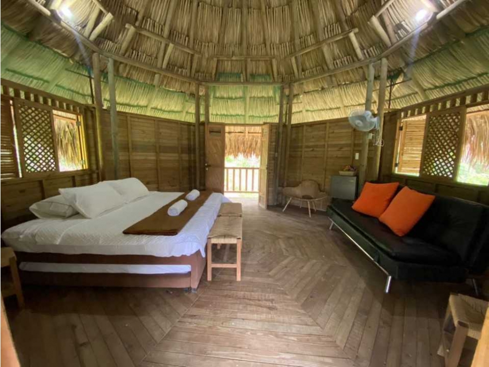 Lote de 1 hectárea con cabañas a menos de 7 kms del parque tayrona — foto 2