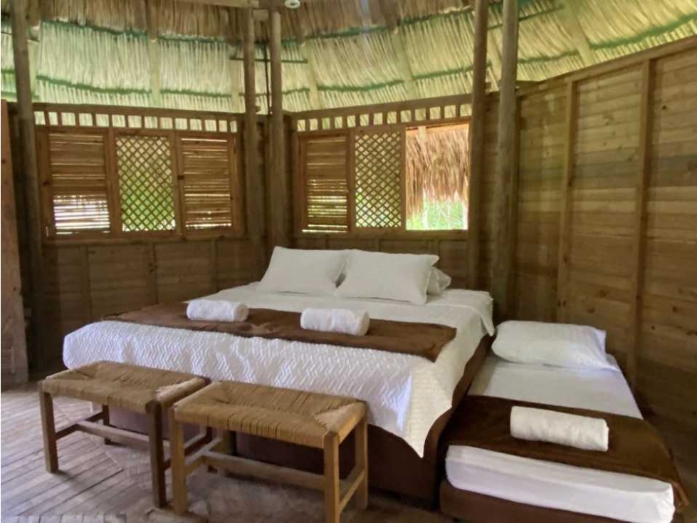 Lote de 1 hectárea con cabañas a menos de 7 kms del parque tayrona — foto 3